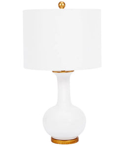 The Klara Lamp features a sleek, contemporary finish on a classic silhouette. The combination of glossy white ceramic and a gold base adds a touch of elegance to any room.