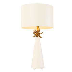 The Anemone Table Lamp features a unique design with its elegant tapered silhouette and distinctive anemone accent. The painted card cylinder shade pairs perfectly to add a touch of elegance to any room.