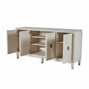 Contemporary ribbed-front cabinet in a white cerused finish with champagne hardware accents.