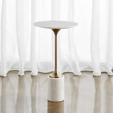 Load image into Gallery viewer, Expertly crafted from honed white marble and a sleek brushed brass metal base, the Trumpet Accent Table showcases the natural beauty of its materials with individual variations in marbling and veining. 
