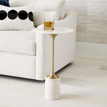 Load image into Gallery viewer, Expertly crafted from honed white marble and a sleek brushed brass metal base, the Trumpet Accent Table showcases the natural beauty of its materials with individual variations in marbling and veining. 
