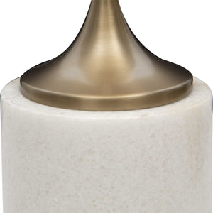 Expertly crafted from honed white marble and a sleek brushed brass metal base, the Trumpet Accent Table showcases the natural beauty of its materials with individual variations in marbling and veining. 